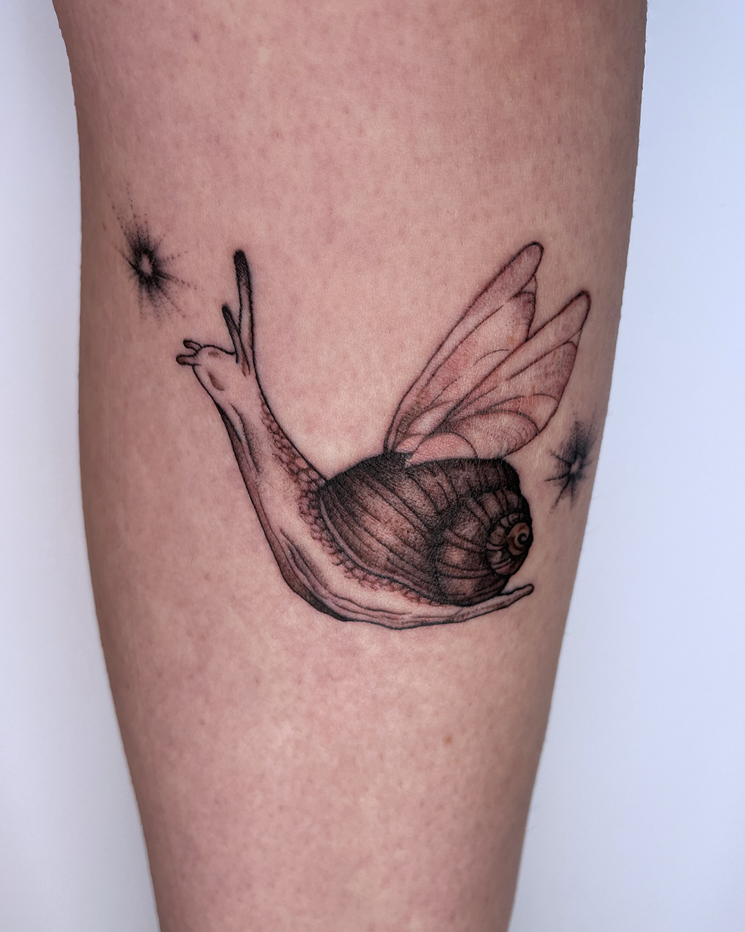 Tatuaje de caracol por Rea